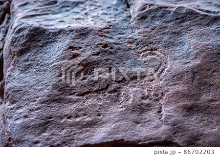 Nabatean and Thamudic inscriptions on rock in Wadi Rum desert 86702203