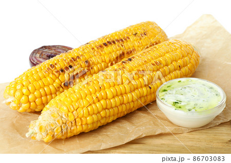 Tasty grilled corn isolated on white background 86703083