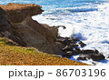 Ocean waves splash against beach with rocks background, Cliffs in the sea, Top aerial view of Cyprus, Nature Background with Sea, Vacation and relax 86703196