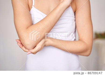 Young woman at office. Tired elbow. Female stress lifestyle. New normal Young woman at office. Tired elbow. Female stress lifestyle. New normal 86709147