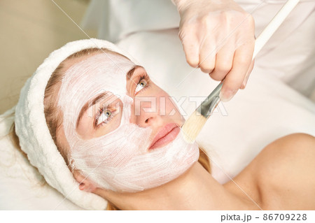 Portrait of moisturizing clay mask for medical design. Woman skin procedure. Portrait of moisturizing clay mask for medical design. Woman skin procedure. 86709228