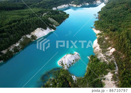 Artificial lake in a chalk quarry in Belarus at Krasnoselsky. Artificial lake in a chalk quarry in Belarus at Krasnoselsky. 86710797