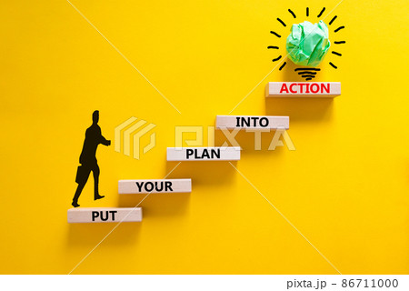 Put your plan into action symbol. Wooden blocks with words Put your plan into action. Beautiful yellow background, copy space. Businessman icon, light bulb. Business, plan into action concept. Put your plan into action symbol. Wooden blocks with words Put your plan into action. Beautiful yellow background, copy space. Businessman icon, light bulb. Business, plan into action concept. 86711000