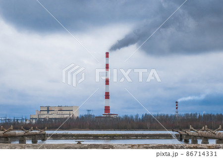 Chimney emits acrid toxic smoke global environmental pollution ecology and sky air combined heat and power plant industrial plant zone Chimney emits acrid toxic smoke global environmental pollution ecology and sky air combined heat and power plant industrial plant zone 86714331