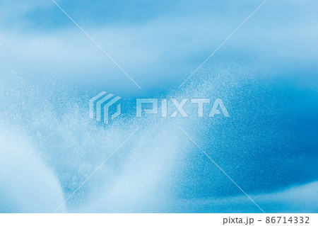 Splashes of water fountain movement of liquid flow against the dark blue sky background Splashes of water fountain movement of liquid flow against the dark blue sky background 86714332