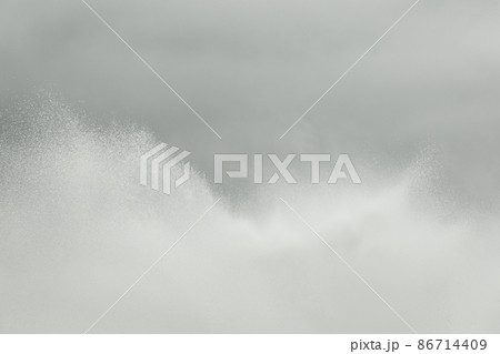 Splashes of water fountain movement of liquid flow against the gray sky background Splashes of water fountain movement of liquid flow against the gray sky background 86714409