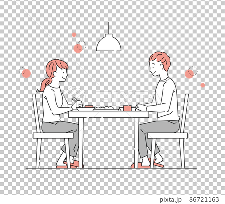 テーブルで食事する女性と男性 86721163