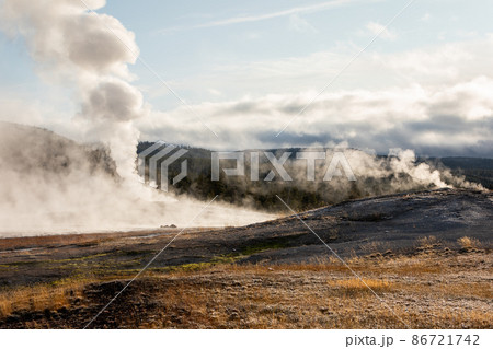 Landscape of hot zone with smoke in Yellowstone. 86721742