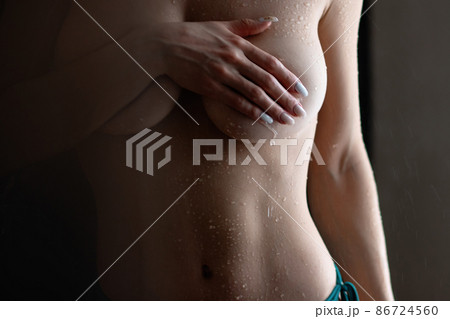 Crop sensual woman covering naked breast Crop sensual woman covering naked breast 86724560