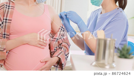 pregnant woman has inject vaccine pregnant woman has inject vaccine 86724624