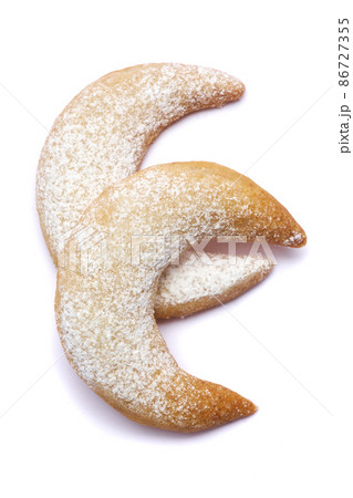 Traditional German or Austrian Vanillekipferl vanilla kipferl cookies isolated on white background Traditional German or Austrian Vanillekipferl vanilla kipferl cookies isolated on white background 86727355