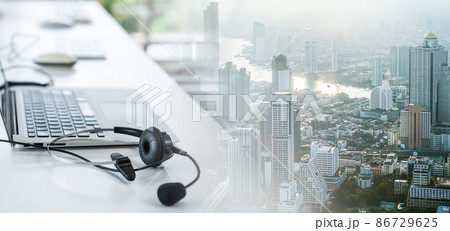 Headset and customer support equipment at call center ready for actively service Headset and customer support equipment at call center ready for actively service 86729625