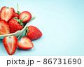 Top view of red strawberry on pastel background with copy space. 86731690