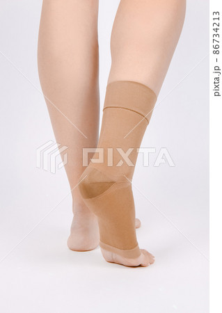 Orthopedic Ankle Brace. Medical Ankle Bandage. Medical Ankle Support Strap Adjustable Wrap Bandage Brace foot Pain Relief Sport. Leg Brace isolated on white background. Trauma Ankle orthosis. Injury. Orthopedic Ankle Brace. Medical Ankle Bandage. Medical Ankle Support Strap Adjustable Wrap Bandage Brace foot Pain Relief Sport. Leg Brace isolated on white background. Trauma Ankle orthosis. Injury. 86734213