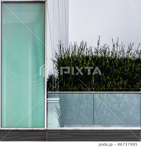 Abstract view of a contemporary office building with geometric figures 86737995