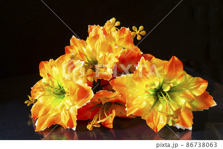 Artificial flowers.Beautiful and bright background close-up. Artificial flowers.Beautiful and bright background close-up. 86738063
