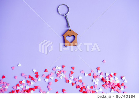 Valentine's day concept many small hearts and keychain on purple background Valentine's day concept many small hearts and keychain on purple background 86740184