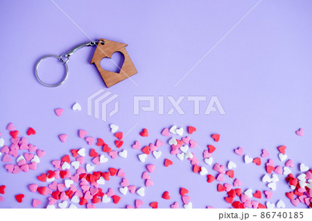 Valentine's day concept many small hearts and keychain on purple background Valentine's day concept many small hearts and keychain on purple background 86740185