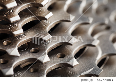 Bicycle road cassette close-up on a black background Bicycle road cassette close-up on a black background 86744003