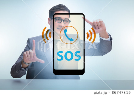 Businessman pressing SOS button in case of danger Businessman pressing SOS button in case of danger 86747319