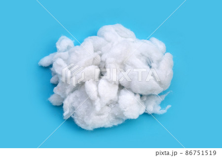 Polyester stable fiber on blue background. Polyester stable fiber on blue background. 86751519