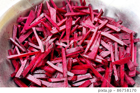 large pieces of beets are fried in a pan large pieces of beets are fried in a pan 86758170