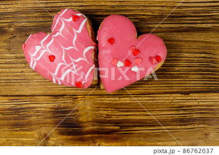 Heart shaped cookies on wooden table. Top view, copy space. Dessert for valentine day 86762037
