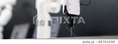 Robot arm automatic drilling machine at industrial production plant Robot arm automatic drilling machine at industrial production plant 86763090