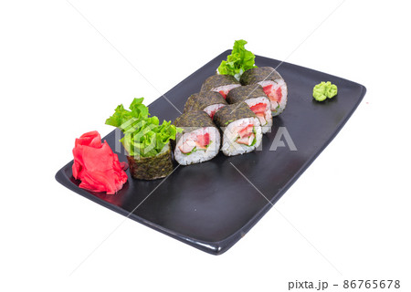 Japanese seafood Sushi roll isolated on white close up. Japanese food restaurant, sushi maki gunkan roll plate or platter set. Maki Sushi rolls with salmon and avocado. Sushi isolated at white 86765678