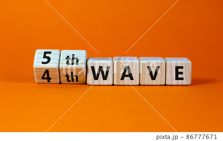 Symbol for a fifth wave of the covid-19 corona virus. Turned cubes and changed words '4th wave' to '5th wave'. Beautiful orange background. Fifth wave of the covid-19 concept. Copy space. Symbol for a fifth wave of the covid-19 corona virus. Turned cubes and changed words '4th wave' to '5th wave'. Beautiful orange background. Fifth wave of the covid-19 concept. Copy space. 86777671