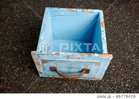 Old Rustic Wood Blue Box on Ruberoid Grain Surface Old Rustic Wood Blue Box on Ruberoid Grain Surface 86778428