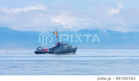 Naval minesweeper in Avacha bay on Kamchatka. Selective focus 86780583