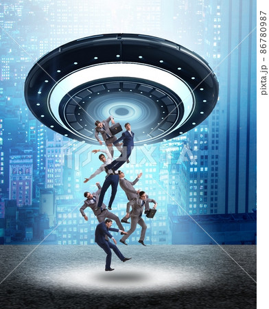 The flying saucer abducting young businessman 86780987