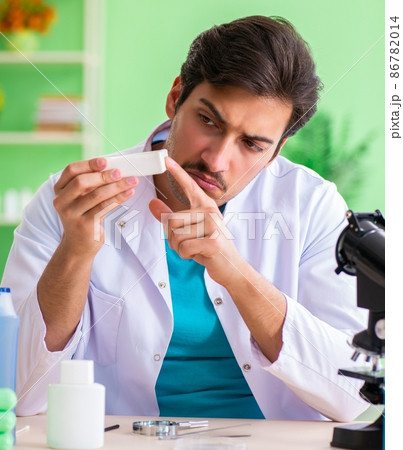 Chemist testing soap in the lab Chemist testing soap in the lab 86782014