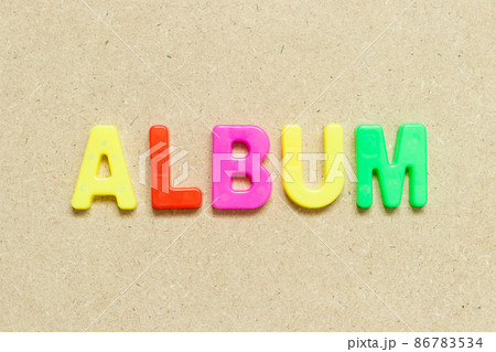 Color alphabet letter with word album on wood background 86783534