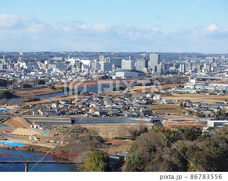 野見山展望台から見た豊田市街地と矢作川の風景 86783556