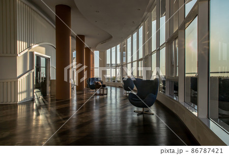 Common area of condominium in morning. 86787421