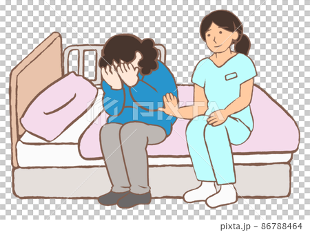 A psychiatric nurse listening closely to a hospitalized schizophrenic patient crying in shock 86788464