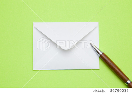 メッセージカードとボールペンの写真素材