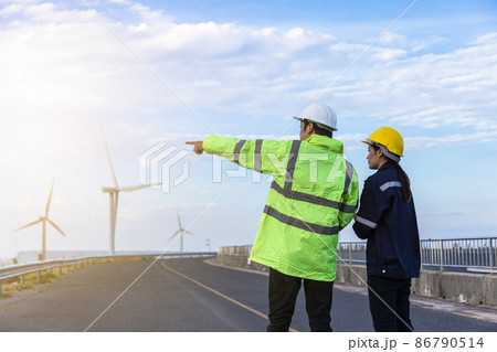 Engineers analysis windmill engineers inspection and progress check wind turbine. Engineers analysis windmill engineers inspection and progress check wind turbine. 86790514