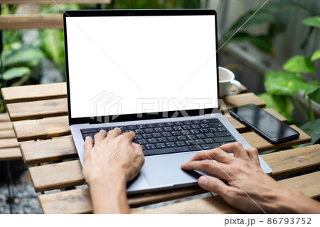 mock up businessman working empty screen laptop computer on wood desk mock up businessman working empty screen laptop computer on wood desk 86793752