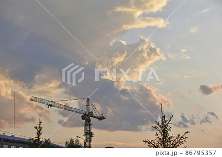 Evening landscape and full moon with a tower crane 86795357