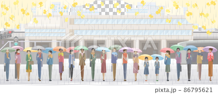 Students and adults walking in front of the station with an umbrella 86795621