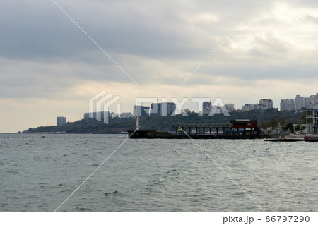 City by the sea and sky with clouds. City by the sea and sky with clouds. 86797290