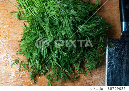 Dill close-up, herb spice for flavoring food. Dill is an annual herbaceous plant. 86799025