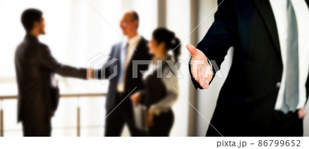 A business man with an open hand ready to seal a deal 86799652
