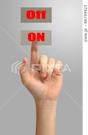 The hand of man presses a button. The hand of man presses a button. 86799925