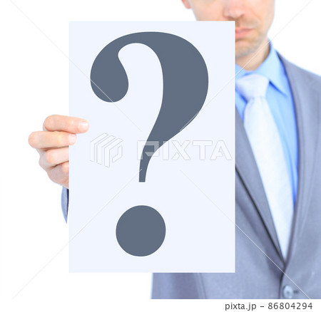 Nice businessman, with a question mark. Isolated on a white background. Nice businessman, with a question mark. Isolated on a white background. 86804294