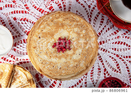 Russian pancake blini with berries and sour cream Russian pancake blini with berries and sour cream 86806961