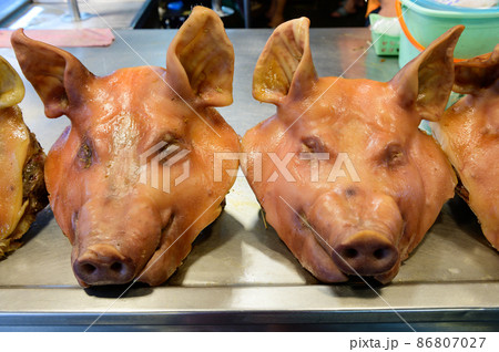 Boiled pig head for sell in fresh market Boiled pig head for sell in fresh market 86807027
